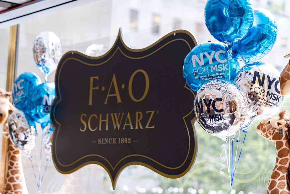 The FAO Schwarz logo and blue and silver NYC for MSK balloons.