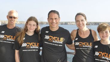Five members of the Milacci family wearing Cycle for Survival shirts.